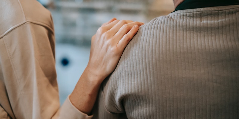 Person offering comfort and support, reflecting a trusted choice for Phoenix families seeking compassionate cremation services care